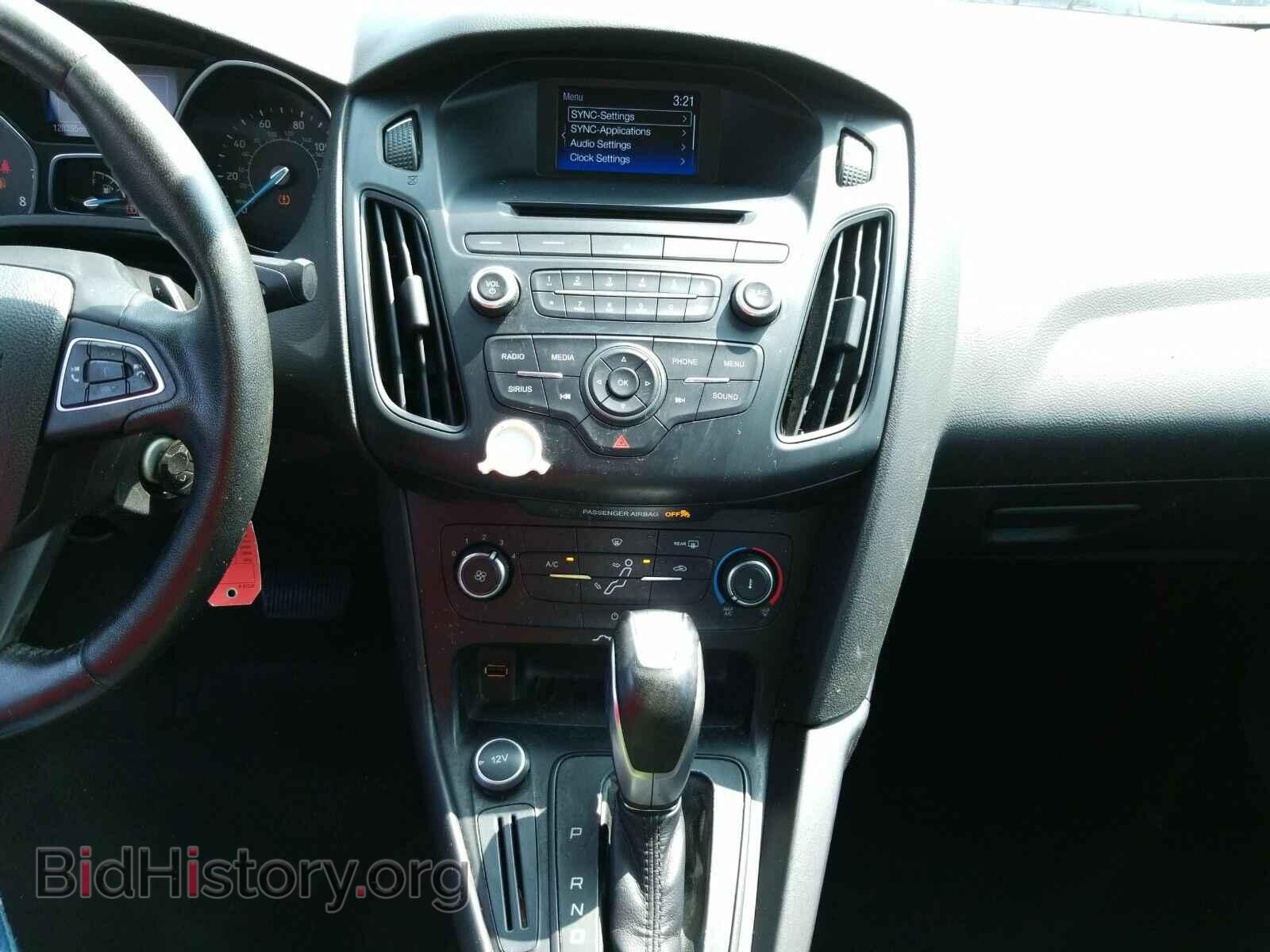 2015 Ford Focus - VIN: 1FADP3F21FL215357 - Фото 4