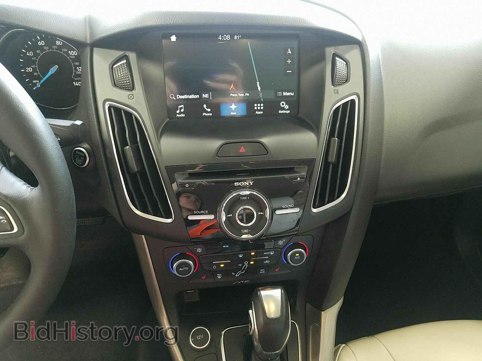 2016 Ford Focus - VIN: 1FADP3J24GL240486 - Photo 4