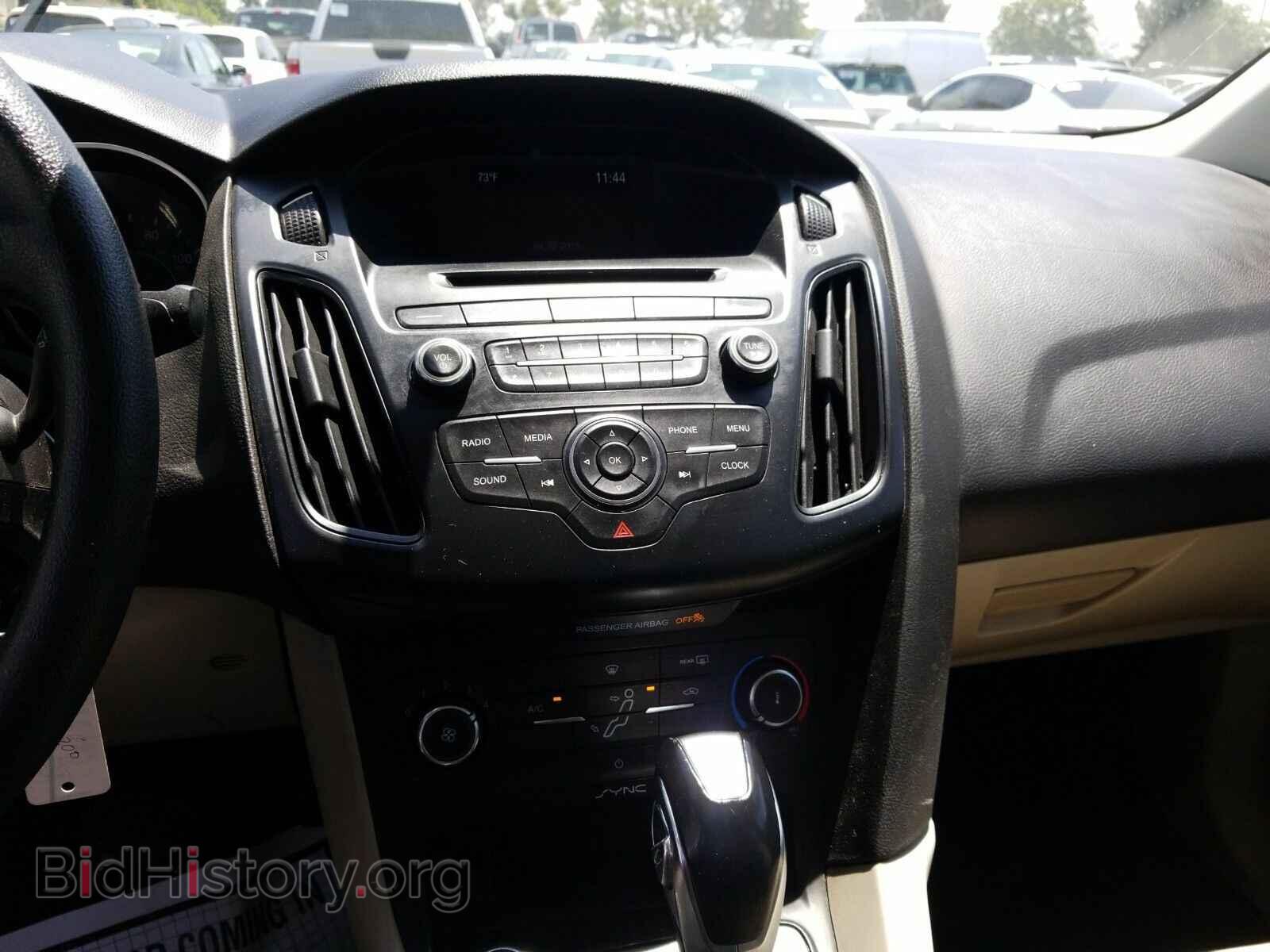 2015 Ford Focus - VIN: 1FADP3F20FL203779 - Photo 4