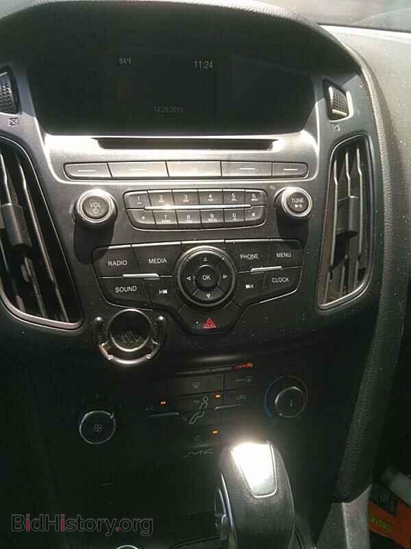 2015 Ford Focus - VIN: 1FADP3F27FL317018 - Photo 4