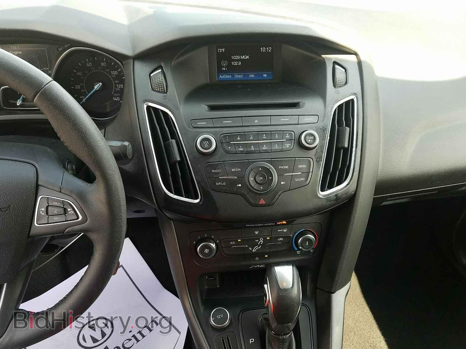 2016 Ford Focus - VIN: 1FADP3F28GL308569 - Photo 4