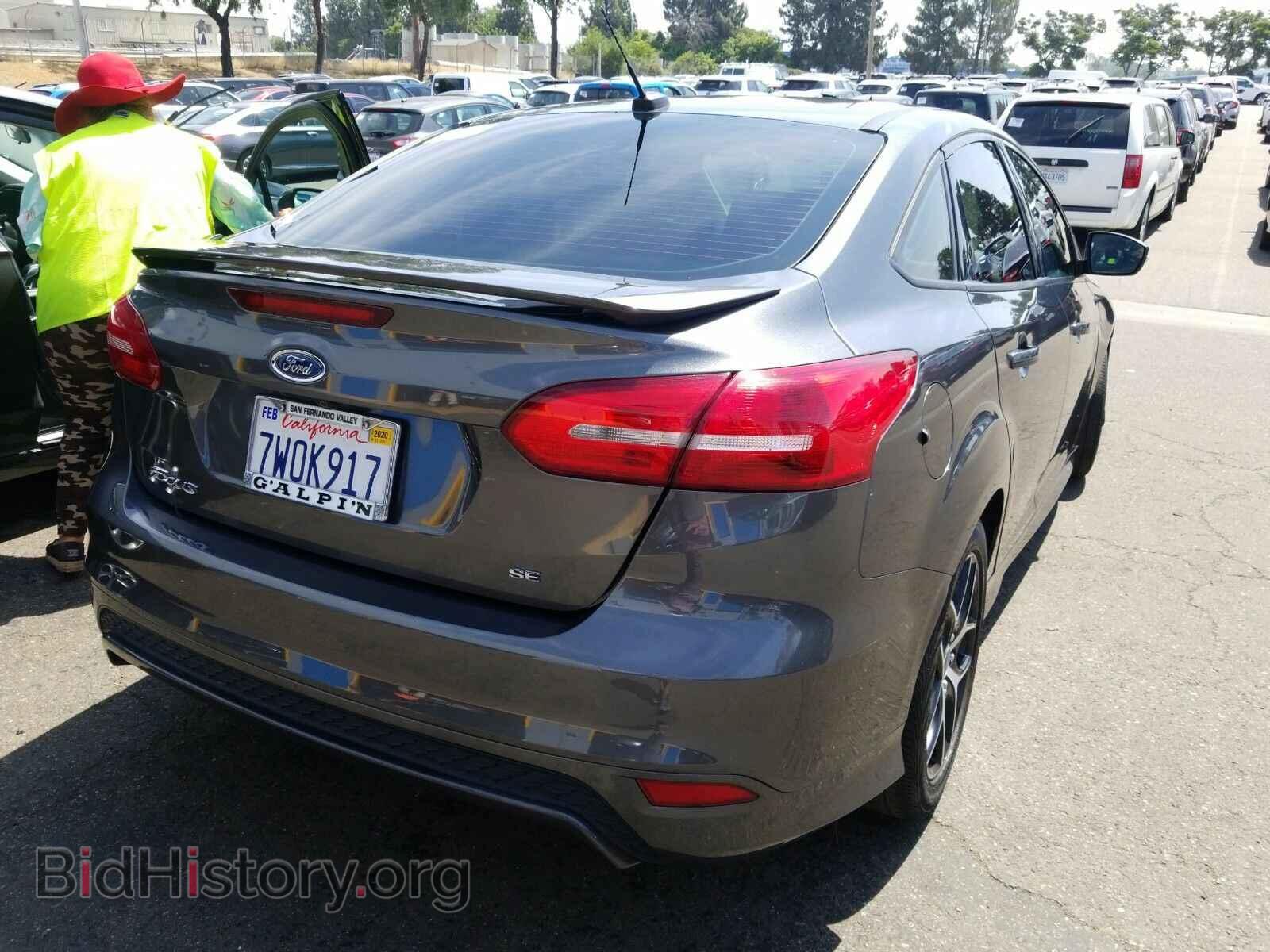 2016 Ford Focus - VIN: 1FADP3F23GL406988 - Фото 2