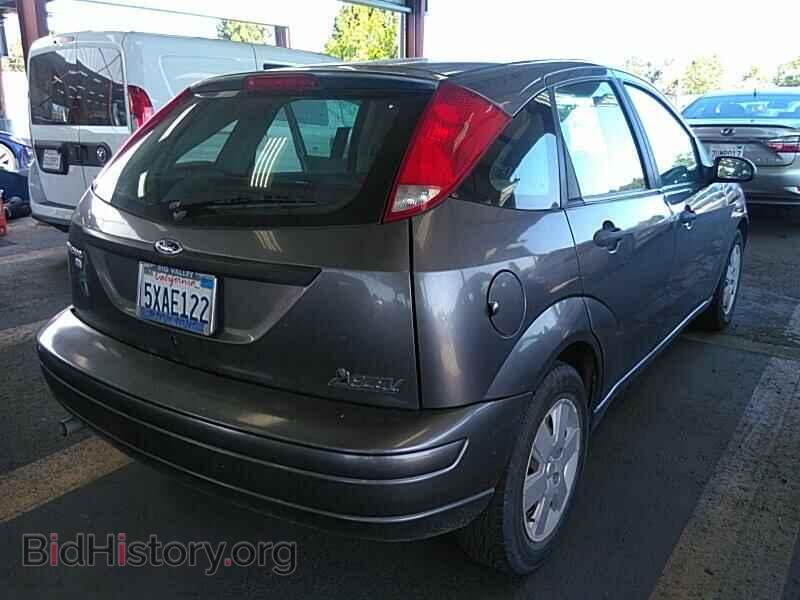 2007 Ford Focus - VIN: 1FAHP37N97W112584 - Фото 2