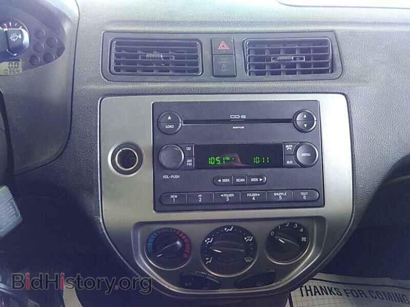 2007 Ford Focus - VIN: 1FAHP37N97W112584 - Фото 4