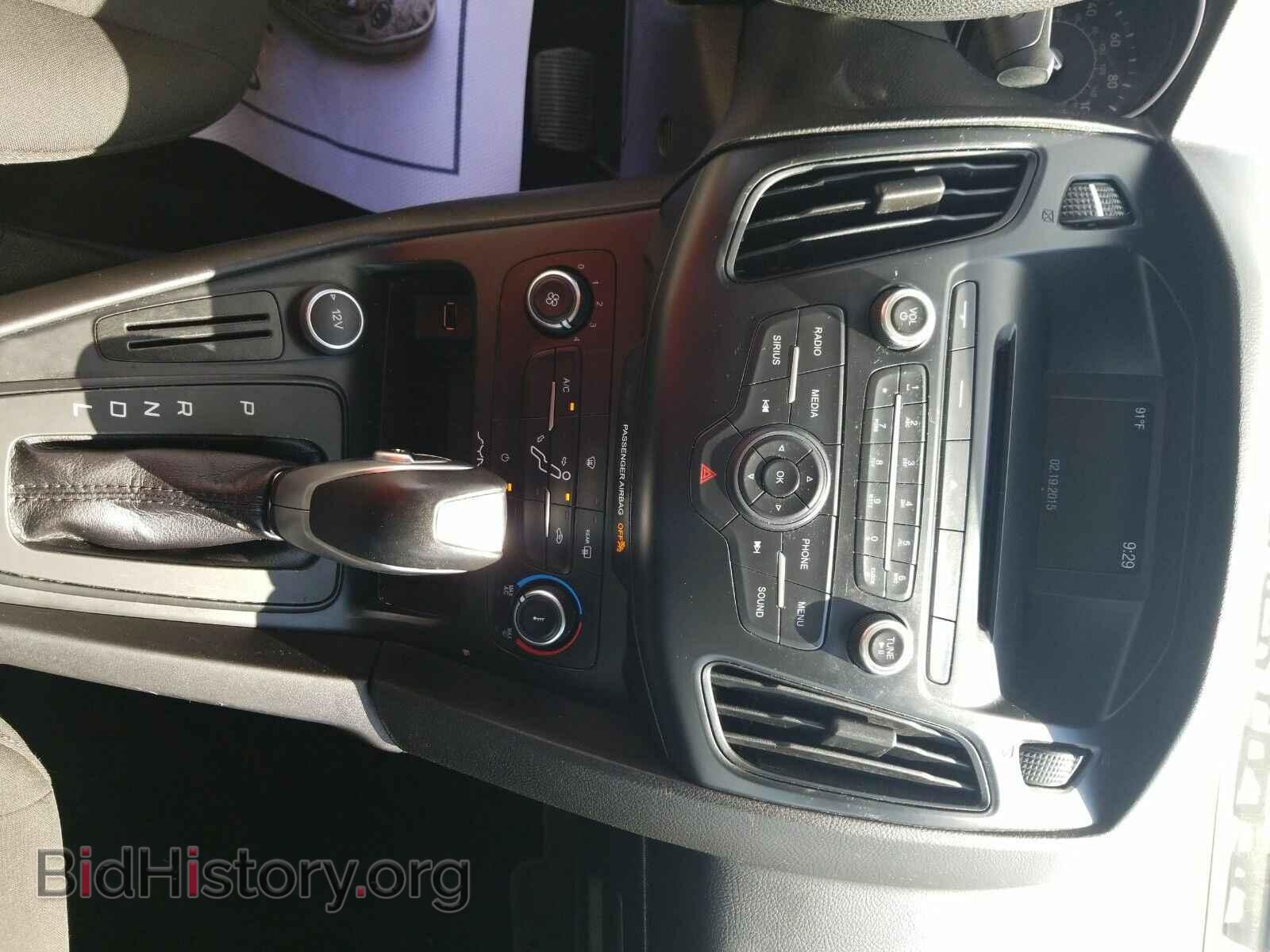 2015 Ford Focus - VIN: 1FADP3F24FL254072 - Фото 4