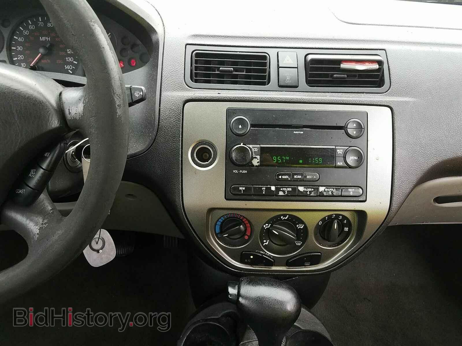 2007 Ford Focus - VIN: 1FAFP34N47W343856 - Фото 4