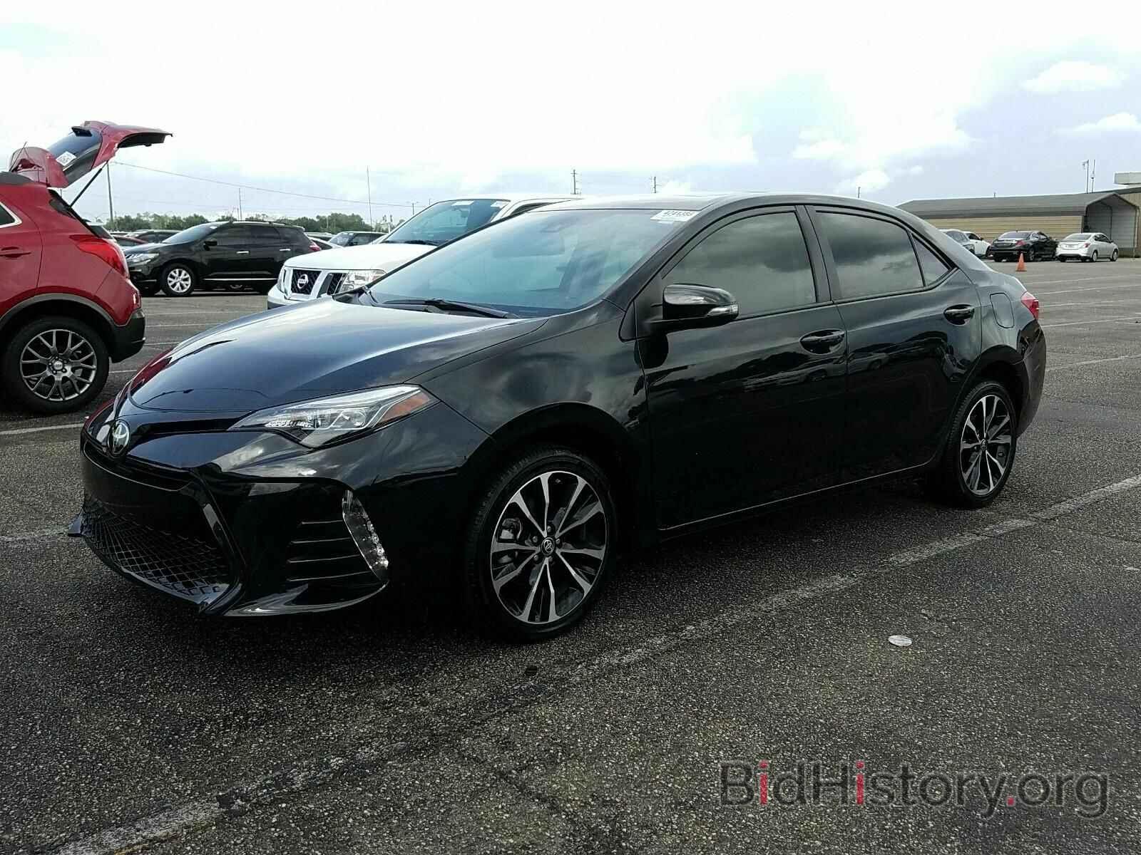 Photo 5YFBURHE9KP916198 - Toyota Corolla 2019