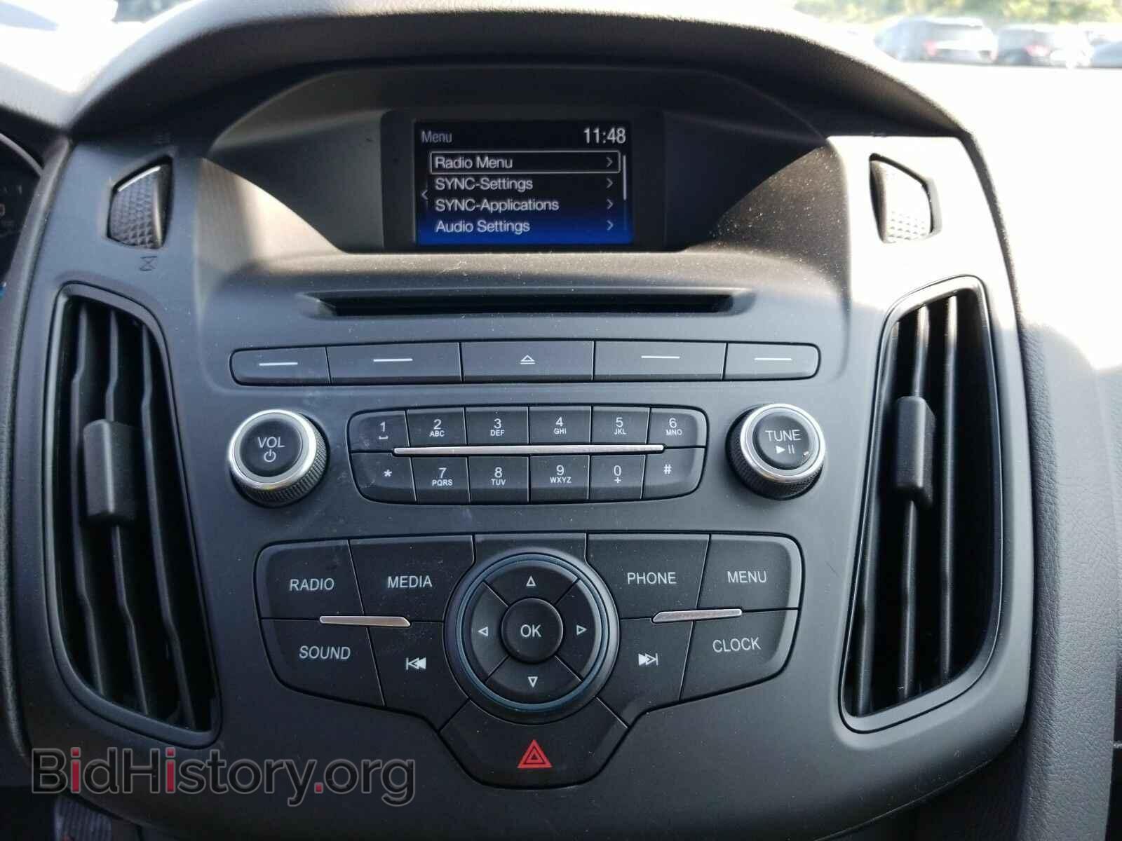 2016 Ford Focus - VIN: 1FADP3F24GL314451 - Photo 4