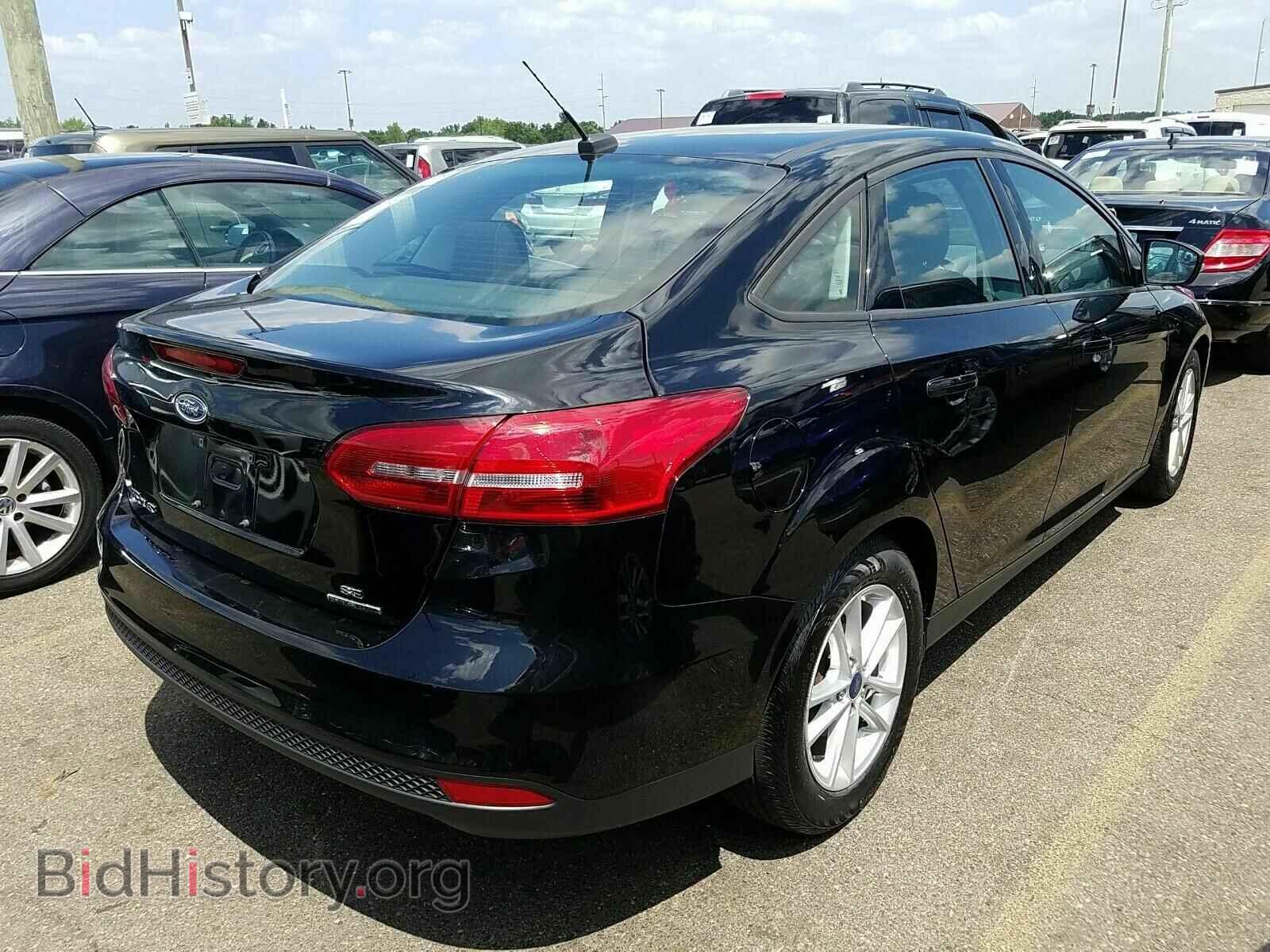 2016 Ford Focus - VIN: 1FADP3F22GL358206 - Photo 2