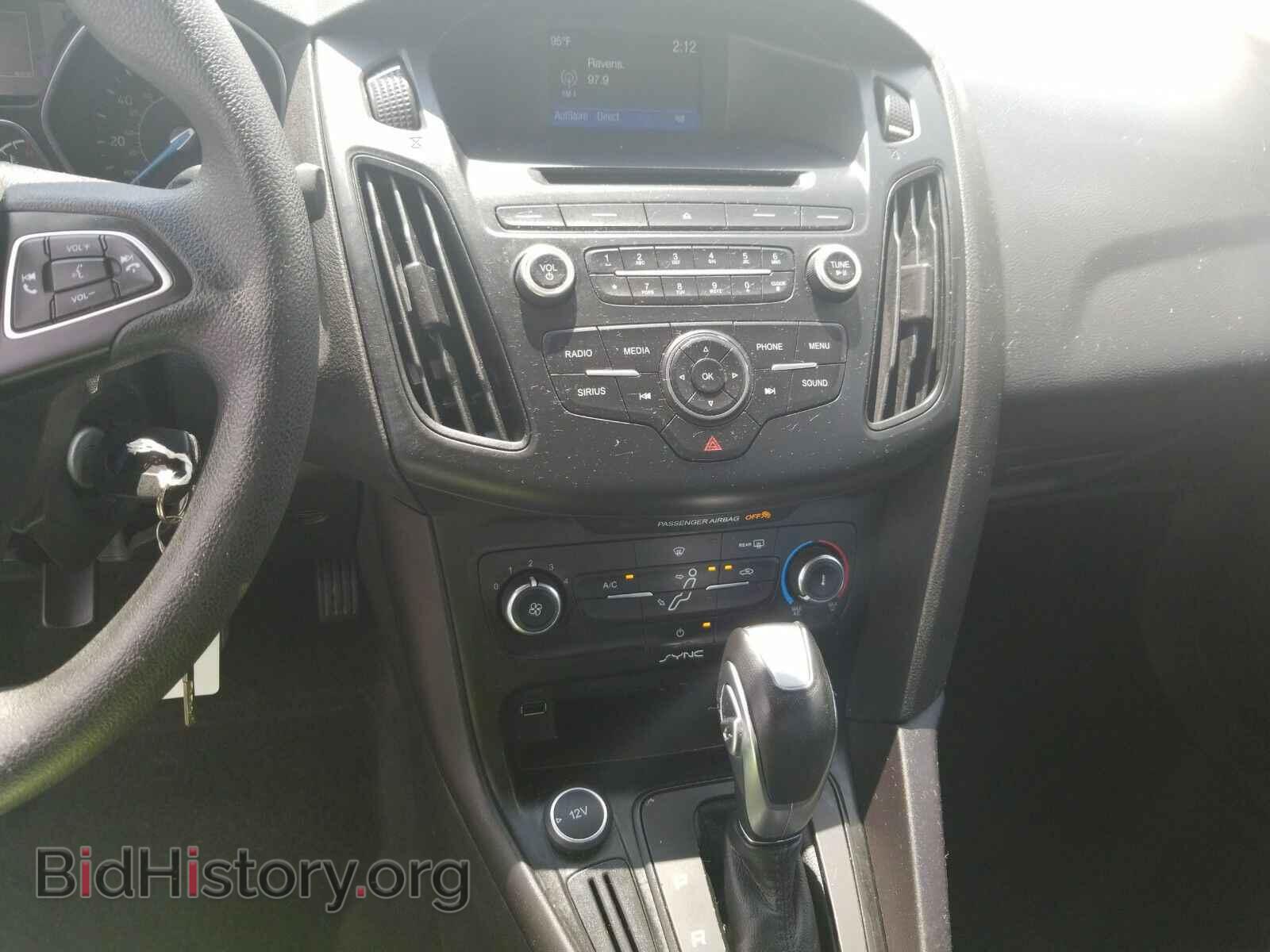2015 Ford Focus - VIN: 1FADP3F21FL311411 - Photo 4
