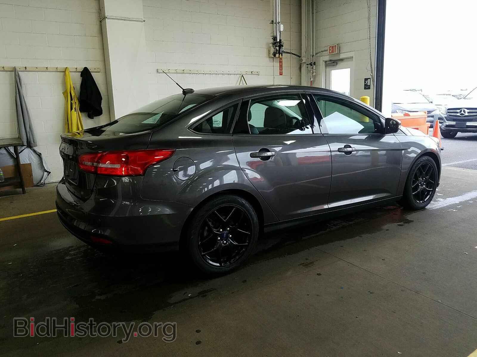 2016 Ford Focus - VIN: 1FADP3F21GL323558 - Photo 2