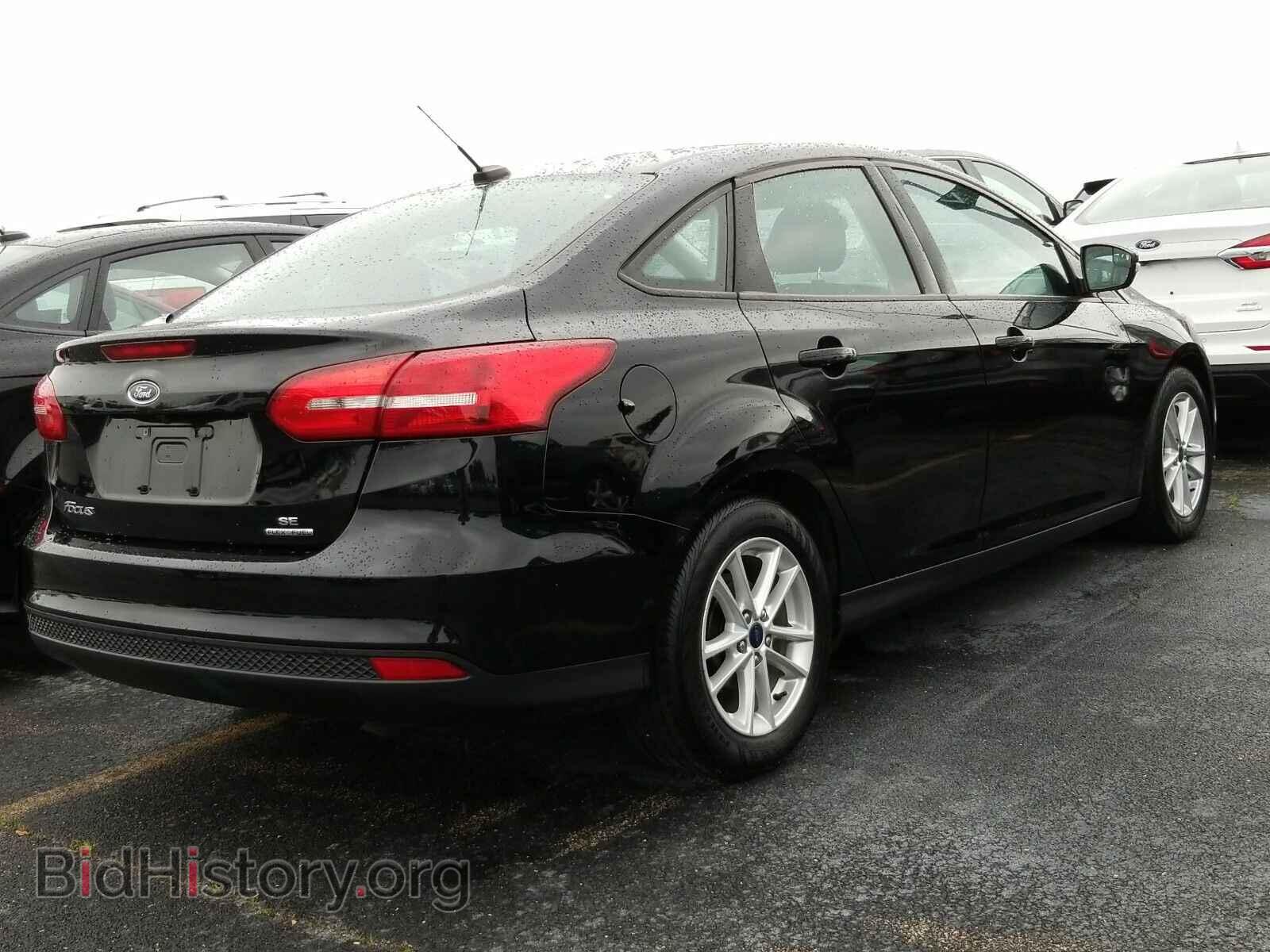 2016 Ford Focus - VIN: 1FADP3F24GL318533 - Photo 2