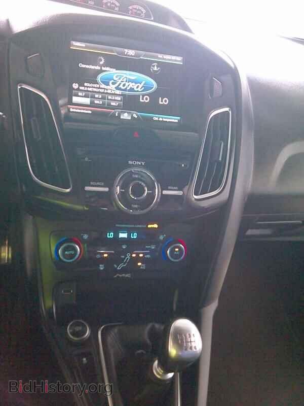 2015 Ford Focus - VIN: 1FADP3L98FL344228 - Photo 4