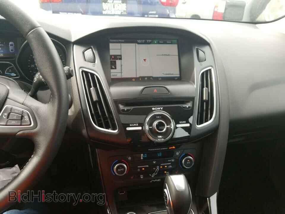 2015 Ford Focus - VIN: 1FADP3N27FL342132 - Photo 4