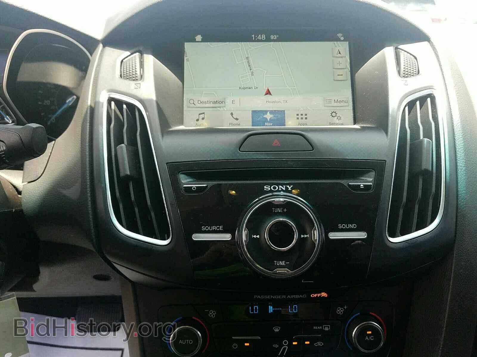 2016 Ford Focus - VIN: 1FADP3F22GL237904 - Photo 4