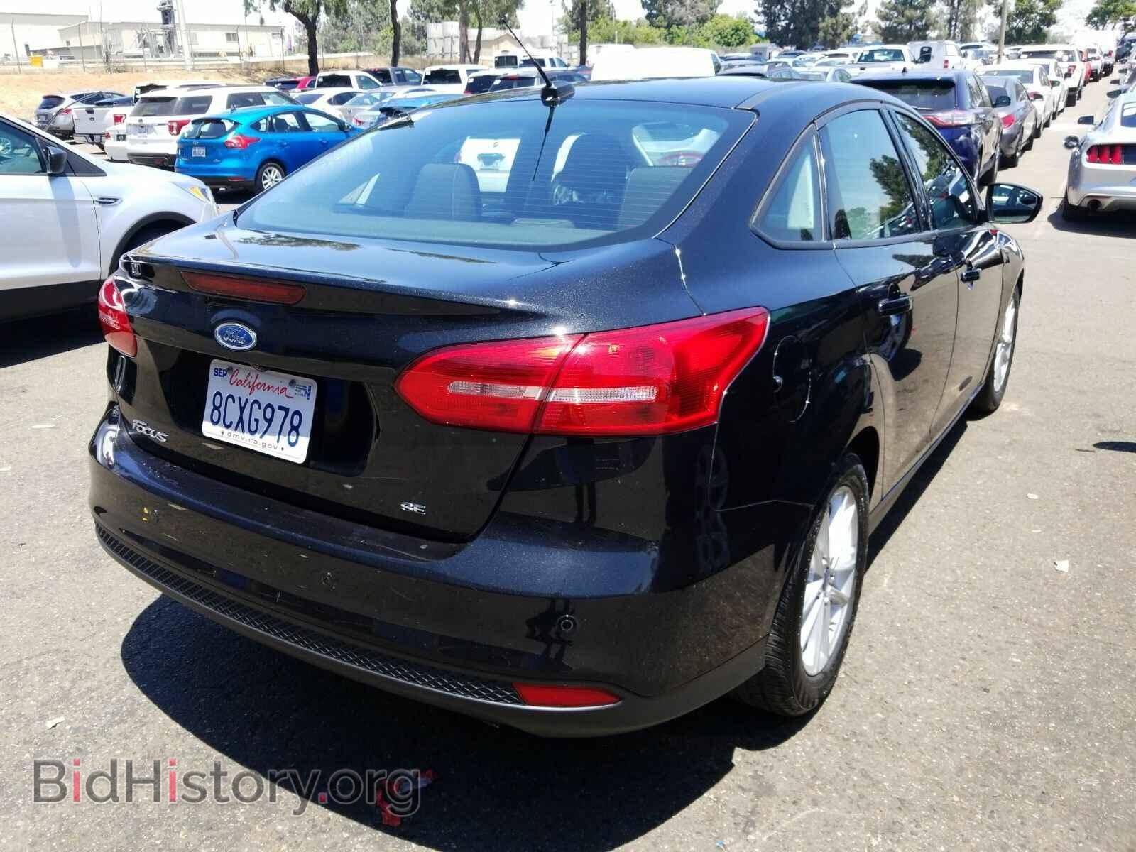 2015 Ford Focus - VIN: 1FADP3F22FL272831 - Photo 2