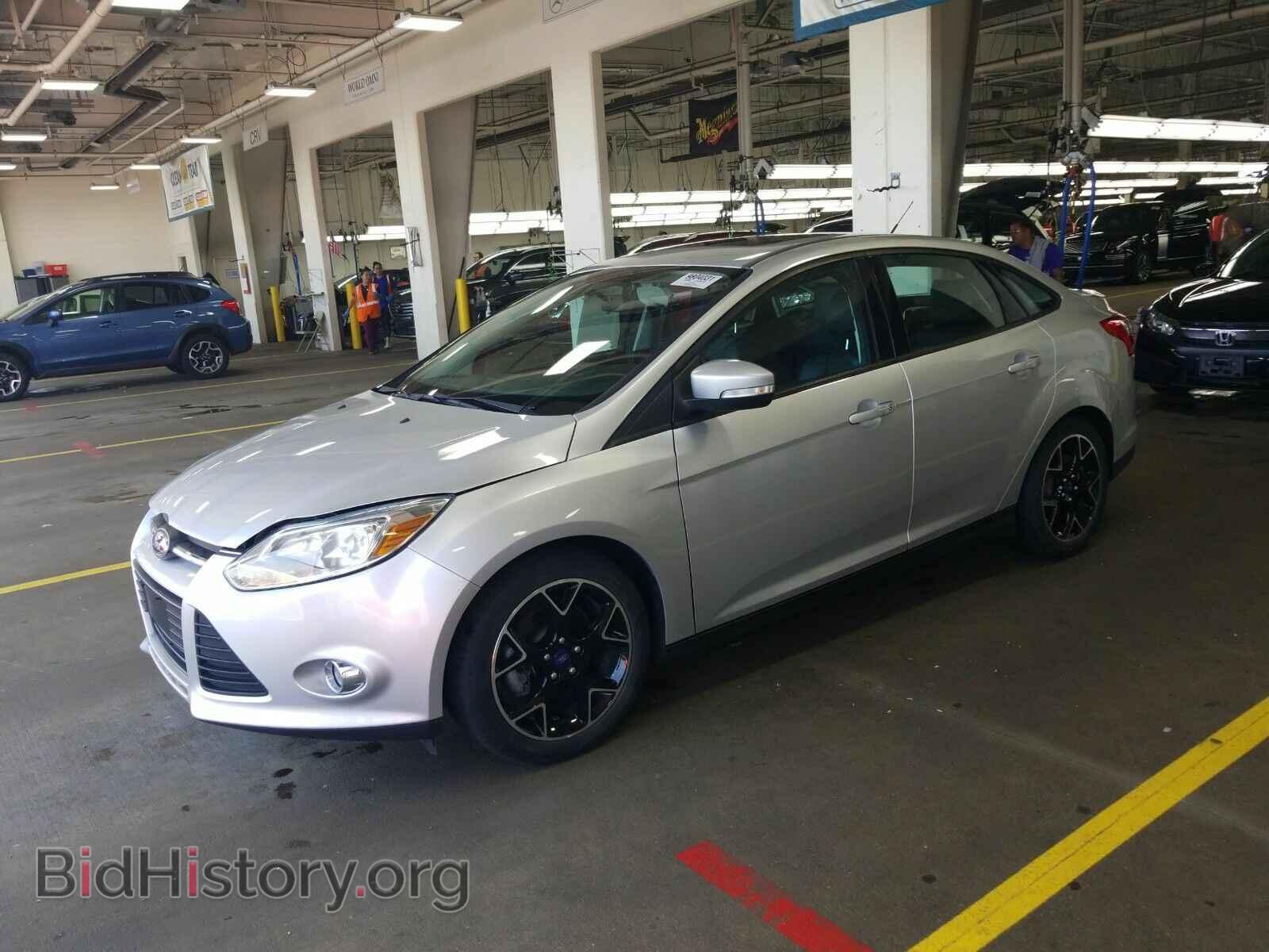 Фотография 1FADP3F29EL104828 - Ford Focus 2014