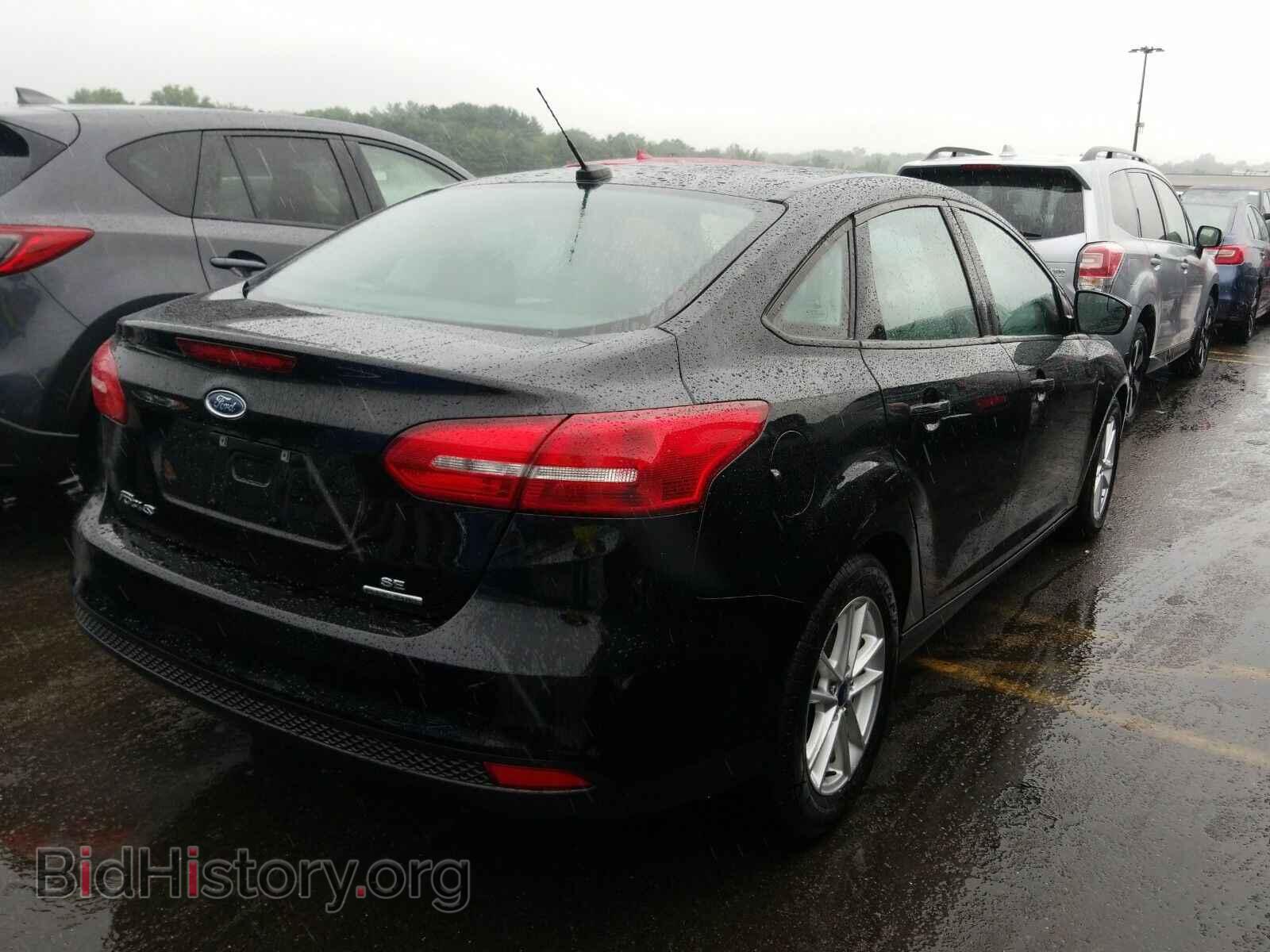 2016 Ford Focus - VIN: 1FADP3F21GL324189 - Photo 2