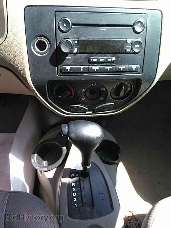 2007 Ford Focus - VIN: 1FAHP34N37W113590 - Фото 4