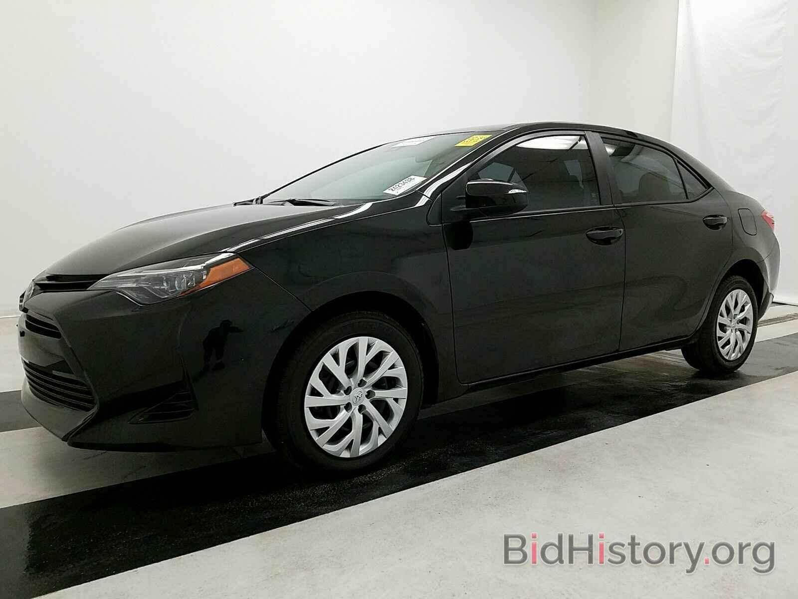 Photo 5YFBURHE6KP864593 - Toyota Corolla 2019