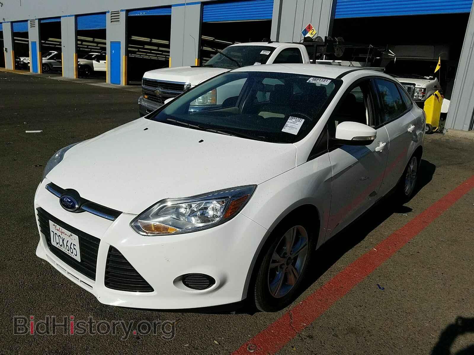 Фотография 1FADP3F24EL119320 - Ford Focus 2014