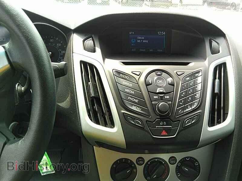 2014 Ford Focus - VIN: 1FADP3F21EL348036 - Фото 4