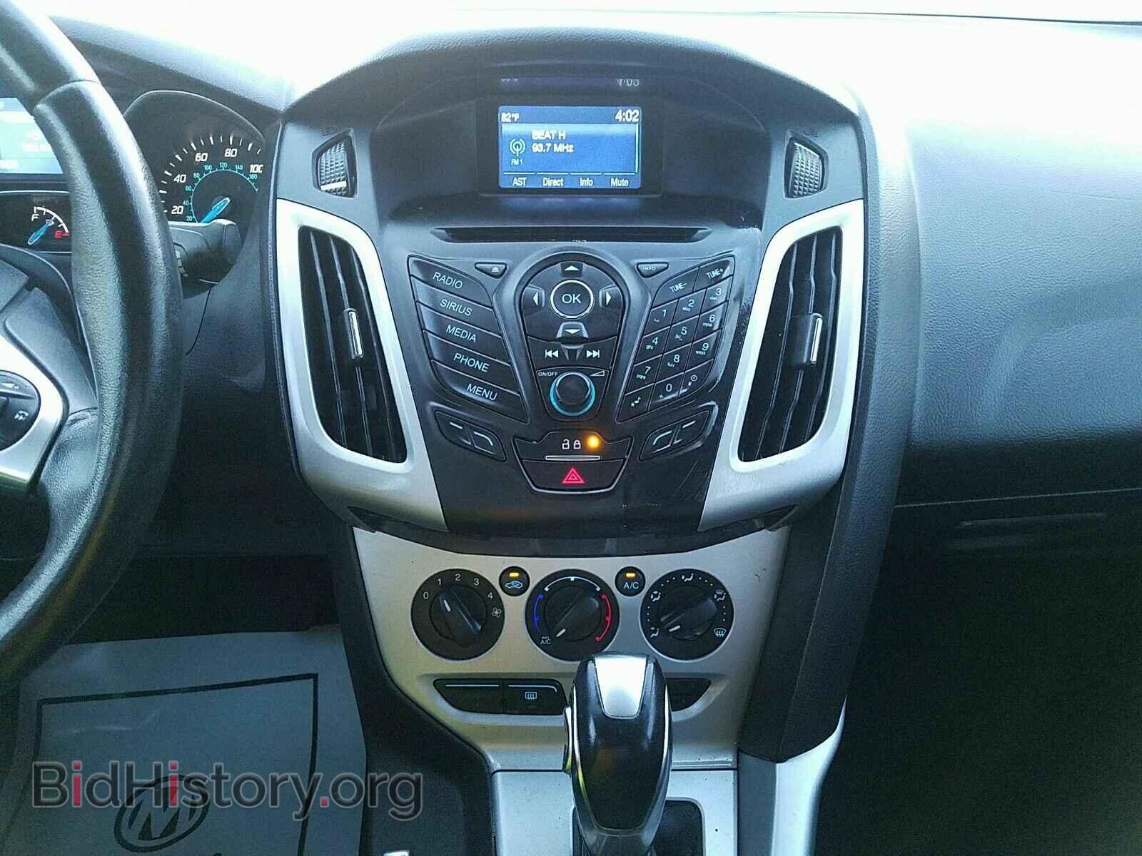 2014 Ford Focus - VIN: 1FADP3F21EL327445 - Фото 4