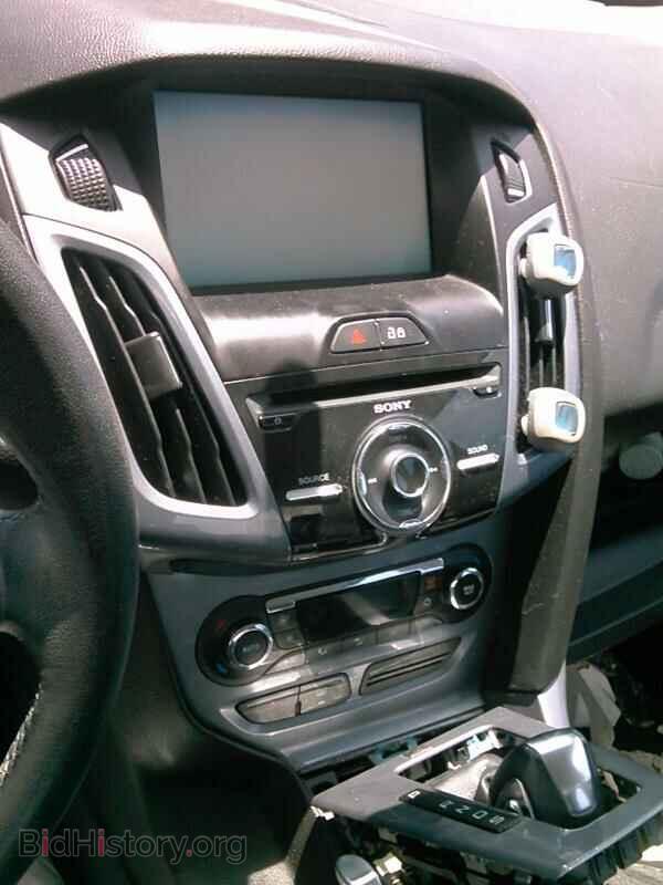 2014 Ford Focus - VIN: 1FADP3J2XEL185216 - Photo 4