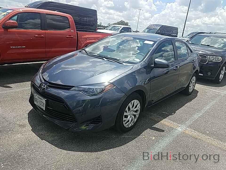 Photo 5YFBURHE4JP751322 - Toyota Corolla 2018