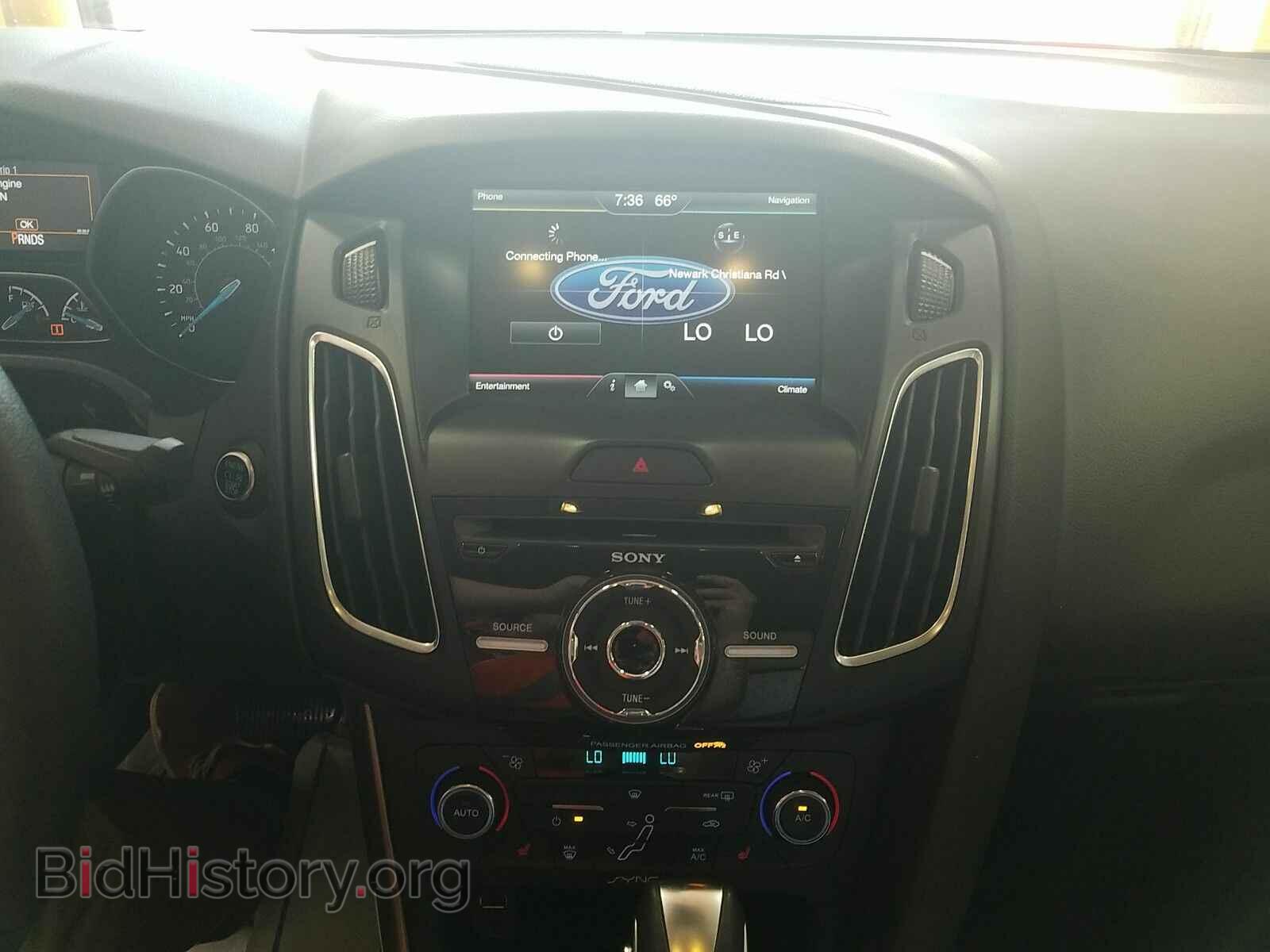 2015 Ford Focus - VIN: 1FADP3J29FL321353 - Фото 4