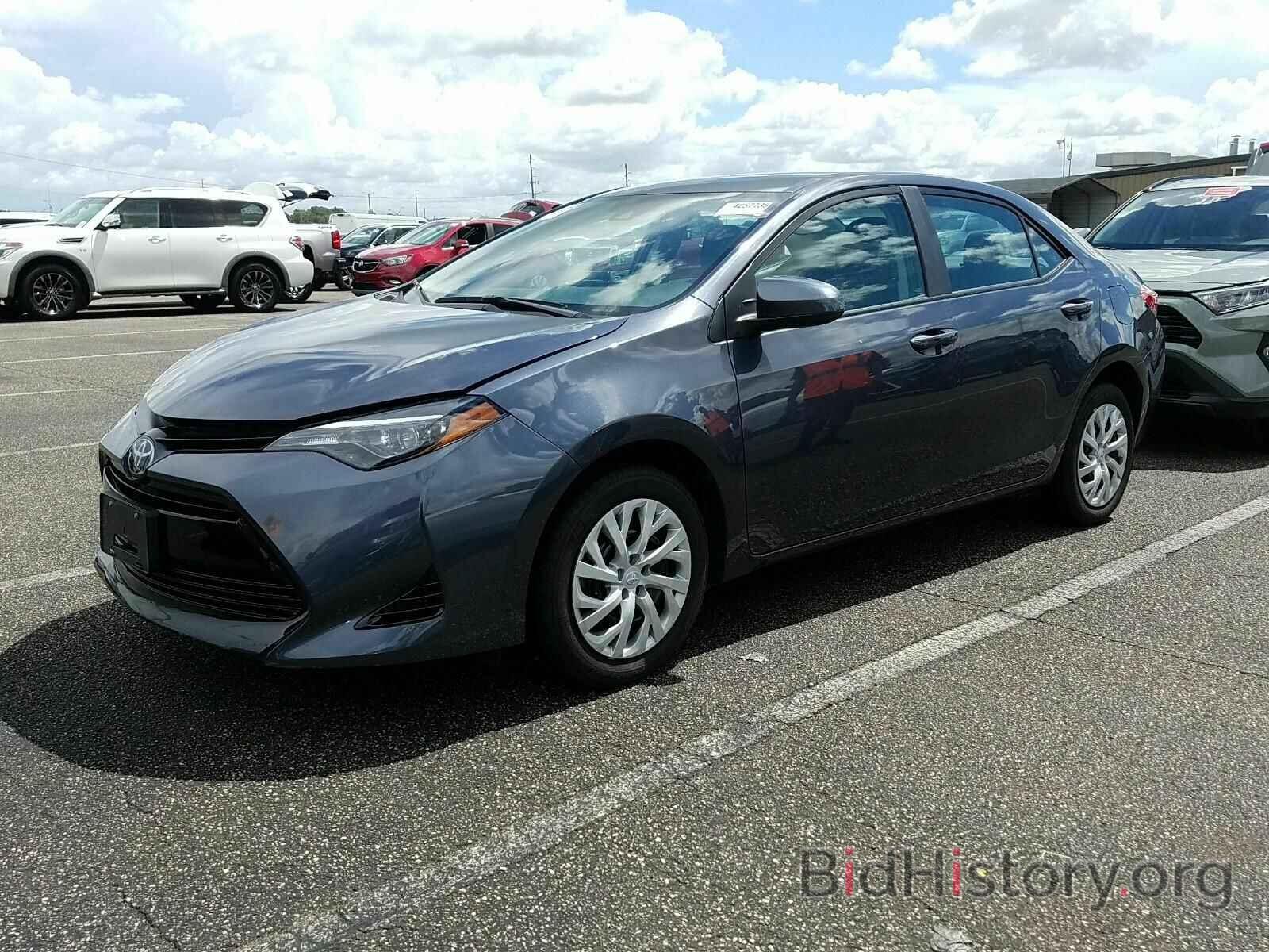 Photo 5YFBURHE0KP857980 - Toyota Corolla 2019