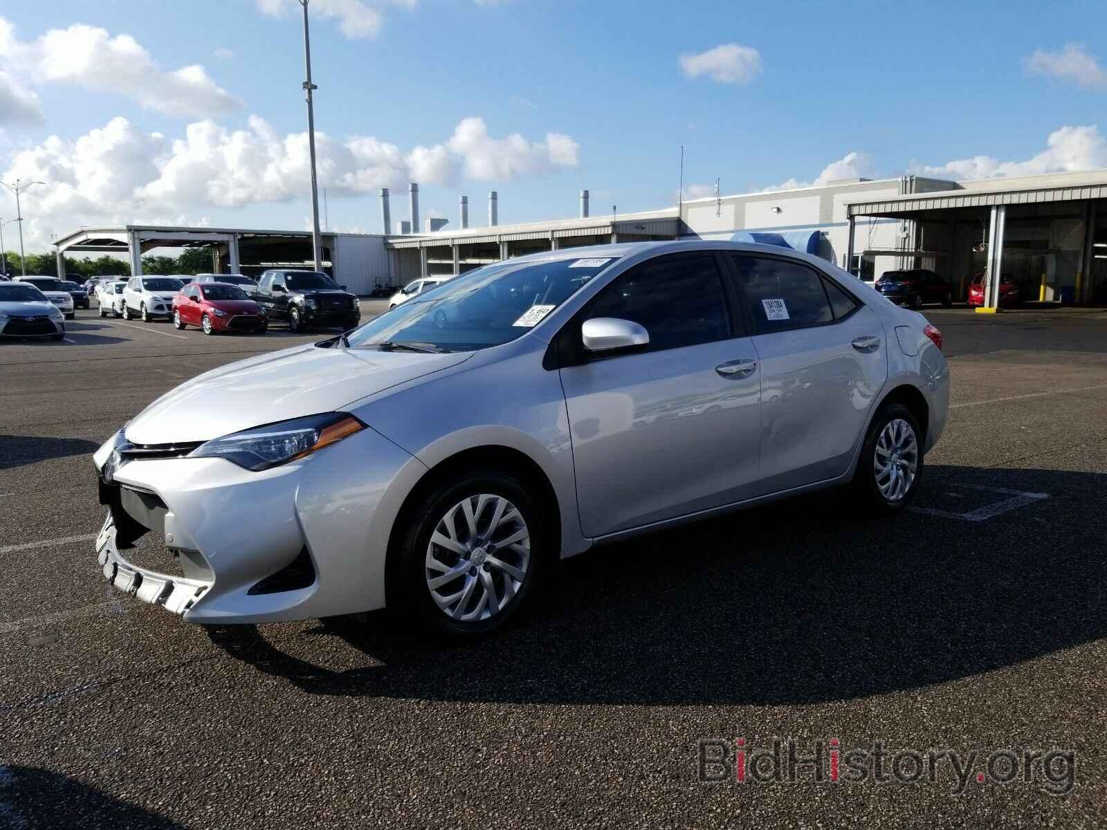 Photo 5YFBURHE5JP842406 - Toyota Corolla 2018