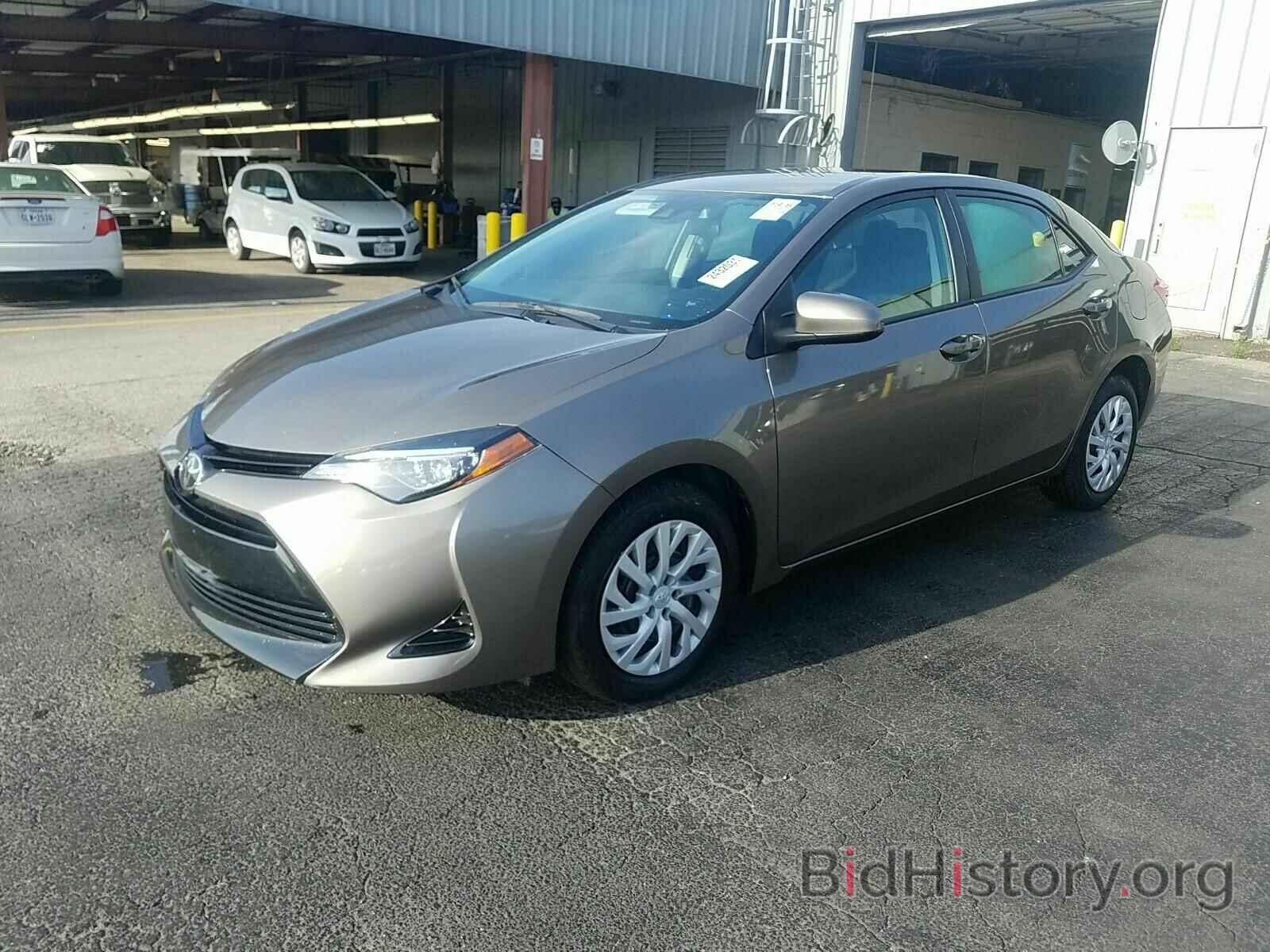 Photo 5YFBURHE4JP763888 - Toyota Corolla 2018