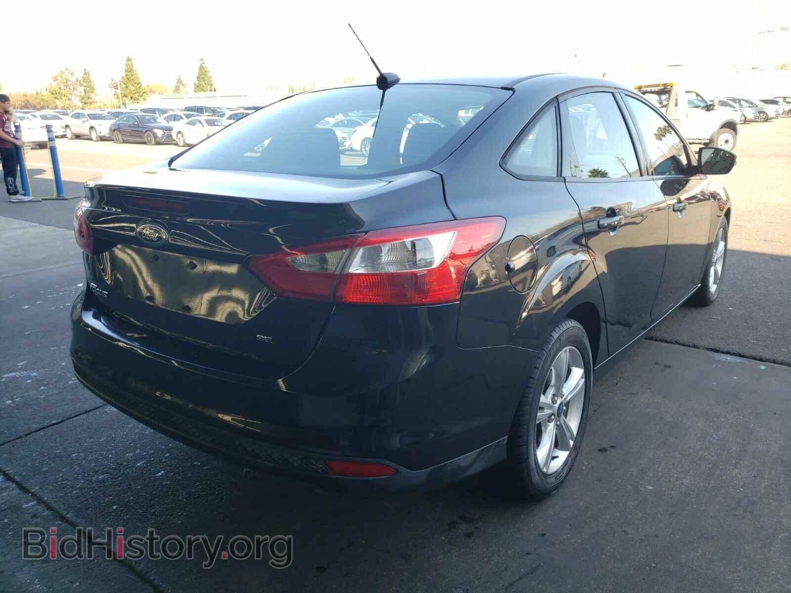 2013 Ford Focus - VIN: 1FADP3F24DL286338 - Photo 2