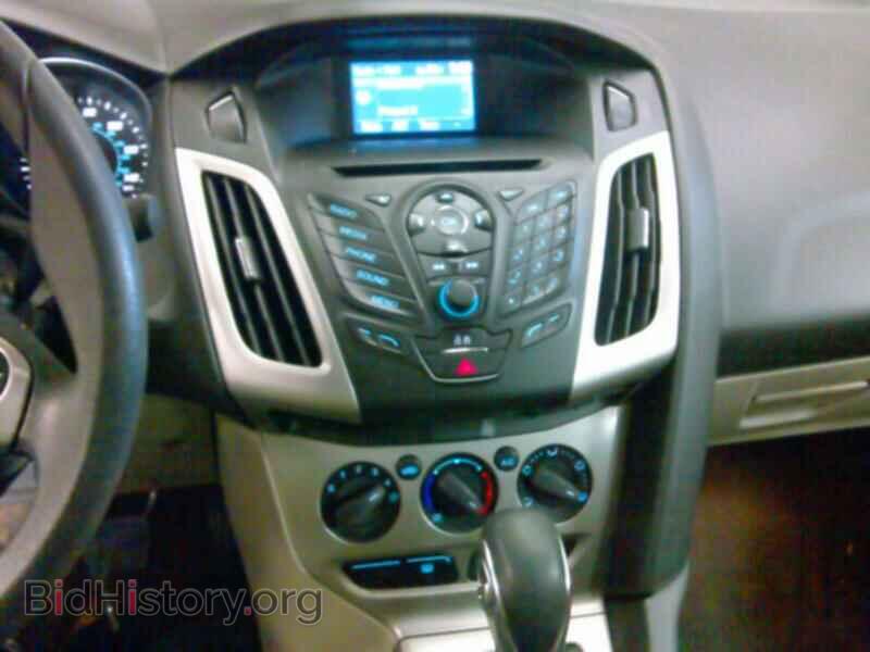 2014 Ford Focus - VIN: 1FADP3F24EL192199 - Фото 4