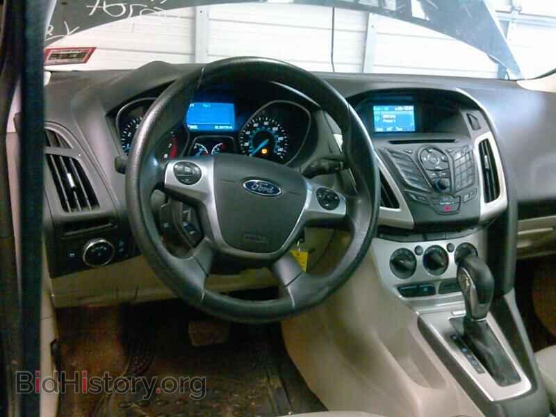 2014 Ford Focus - VIN: 1FADP3F28EL125704 - Фото 4