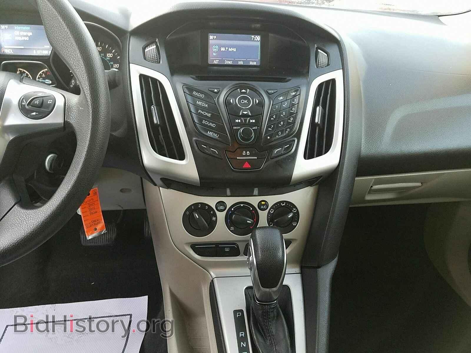 2014 Ford Focus - VIN: 1FADP3F29EL393600 - Фото 4