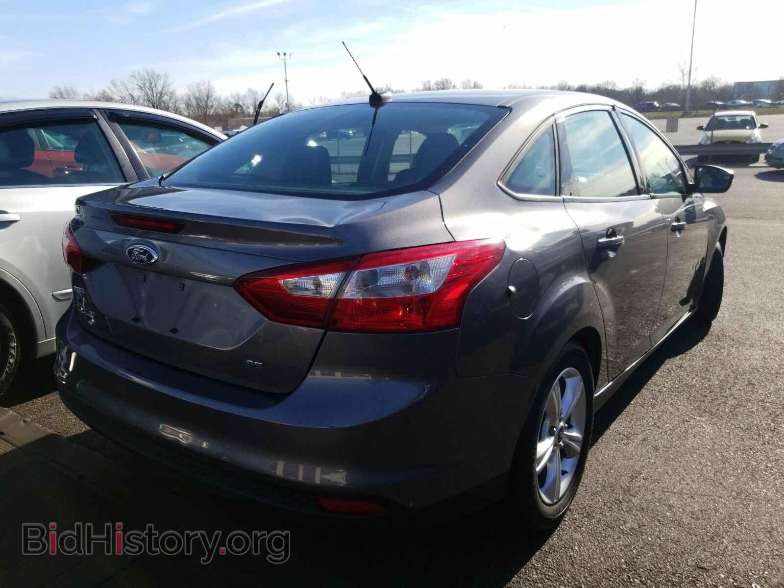2014 Ford Focus - VIN: 1FADP3F25EL244682 - Фото 2