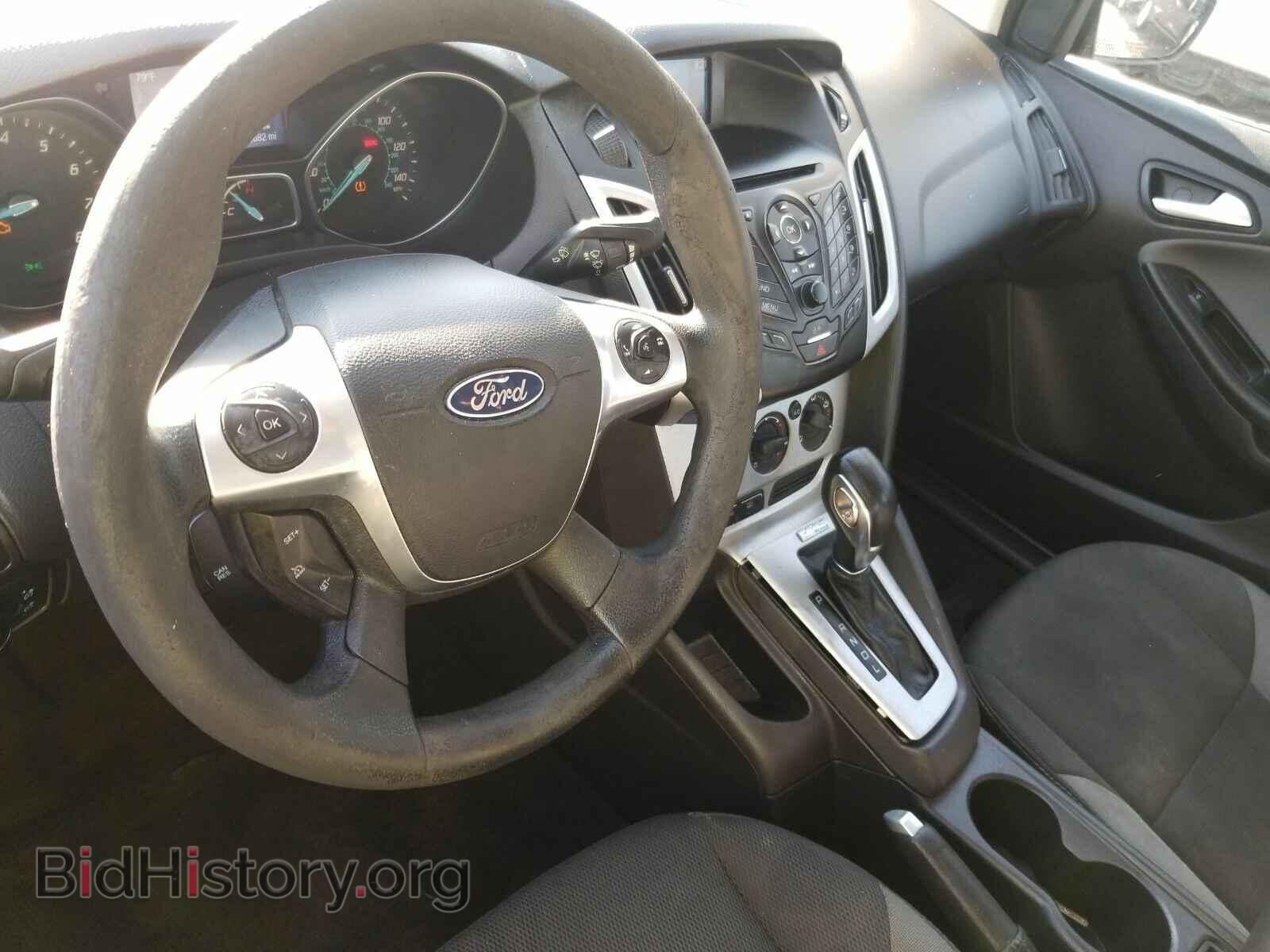 2014 Ford Focus - VIN: 1FADP3F25EL244682 - Фото 4