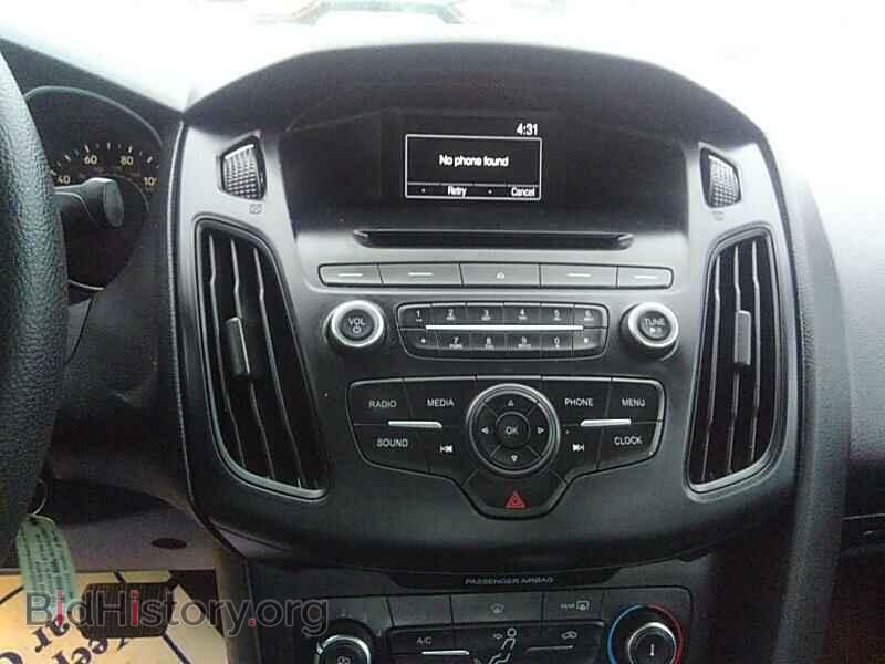 2015 Ford Focus - VIN: 1FADP3F22FL342635 - Photo 4