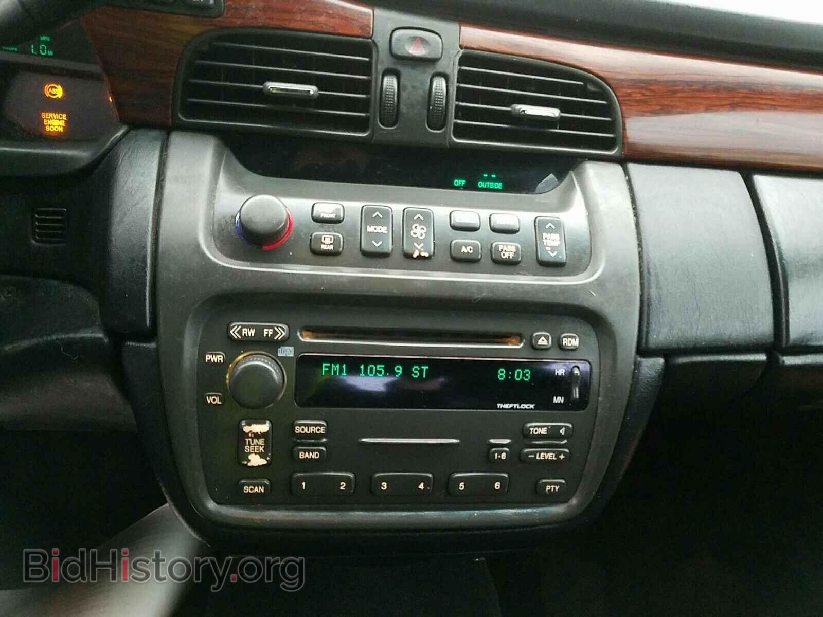 2004 Cadillac DeVille - VIN: 1G6KD54Y14U121941 - Photo 4