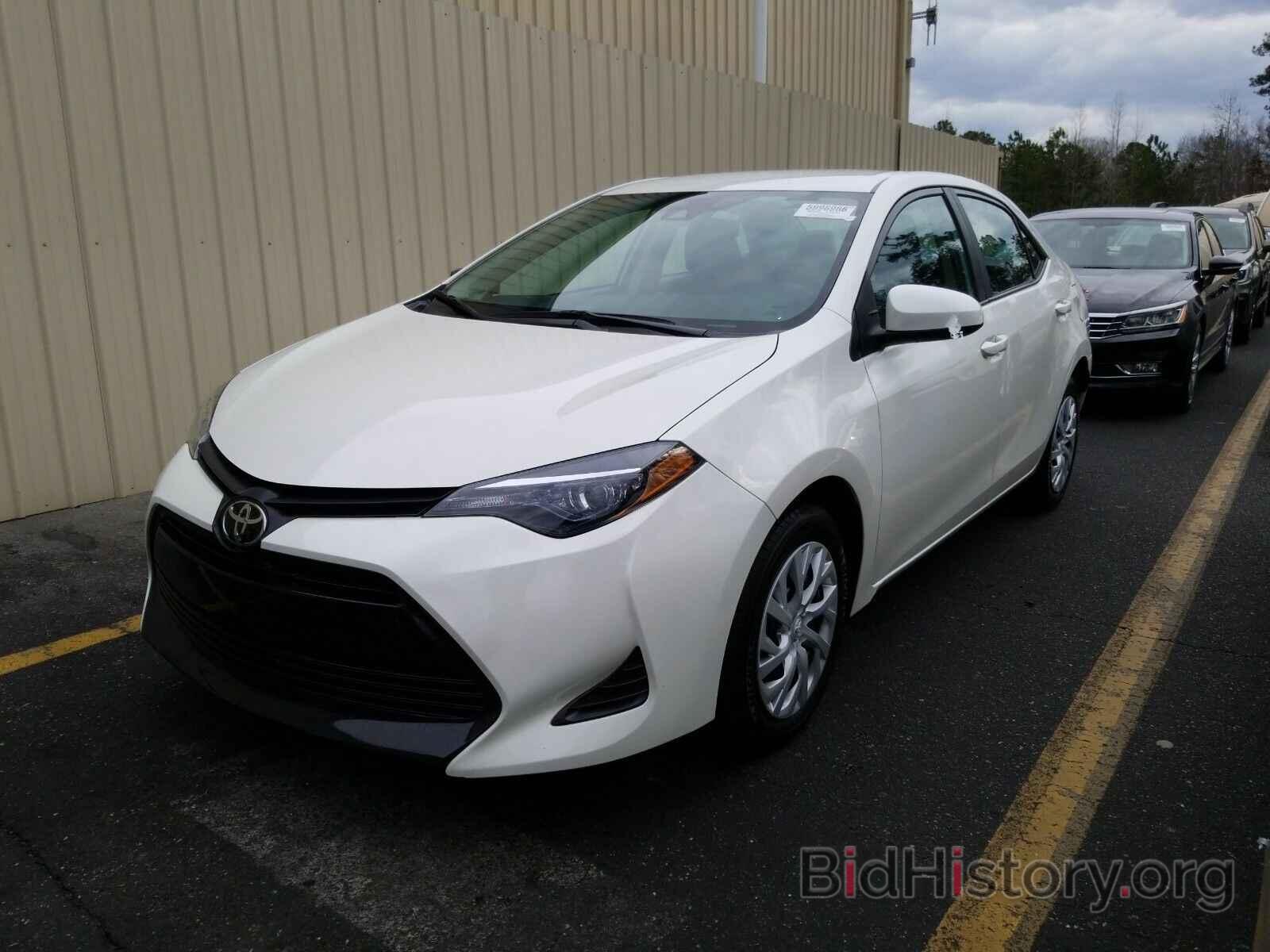 Photo 5YFBURHE7KP884450 - Toyota Corolla 2019