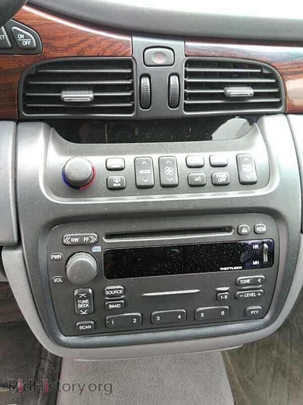 2004 Cadillac DeVille - VIN: 1G6KD54Y74U254266 - Photo 4