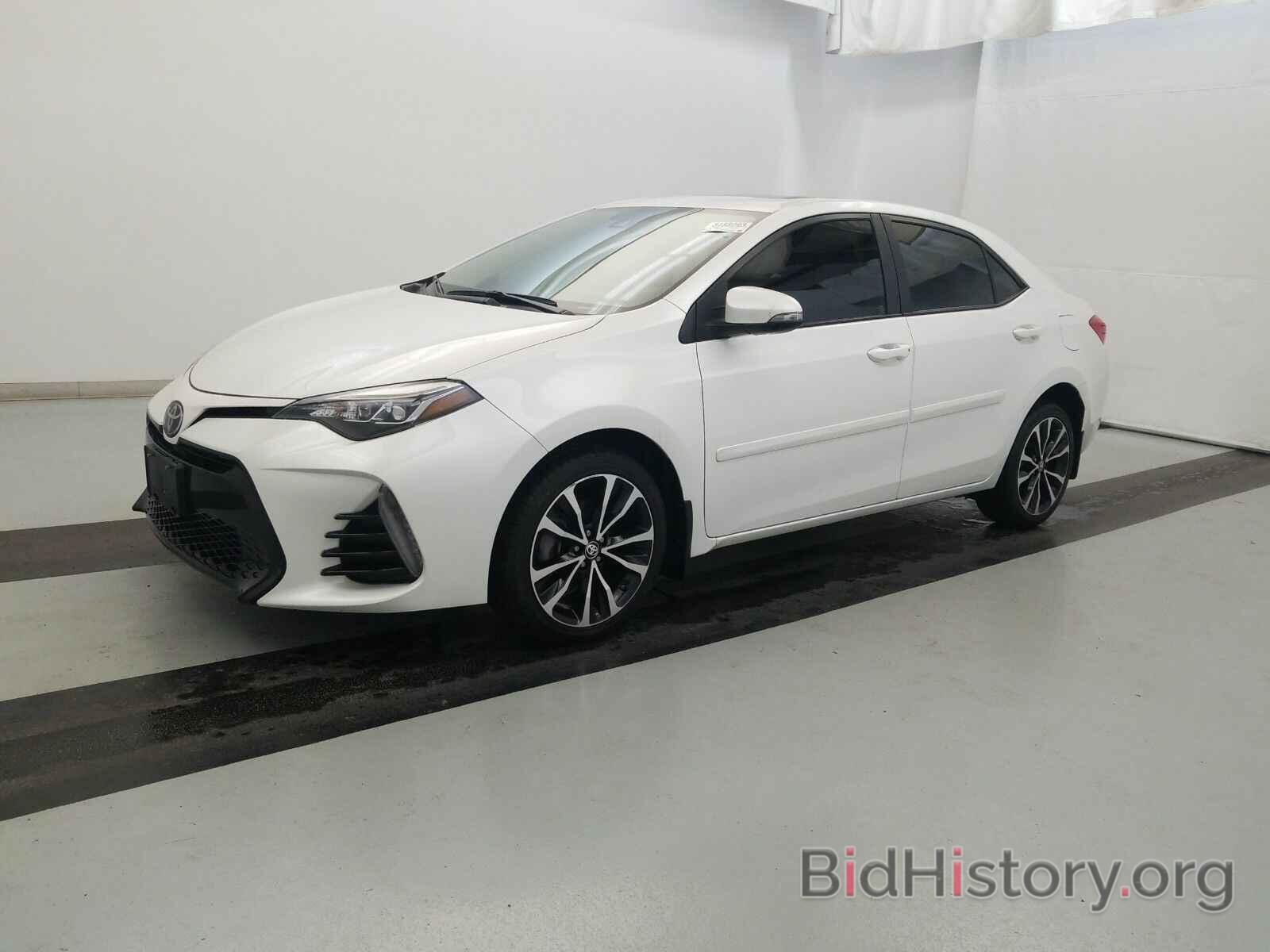 Photo 5YFBURHE8HP608335 - Toyota Corolla 2017