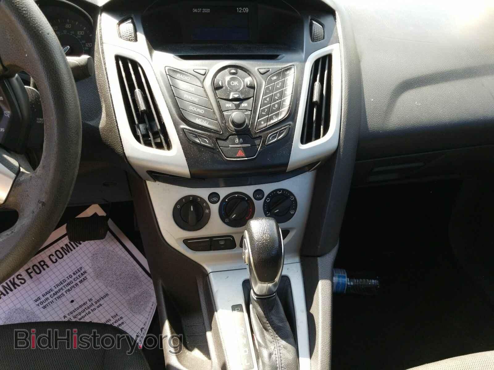 2014 Ford Focus - VIN: 1FADP3F28EL272251 - Фото 4