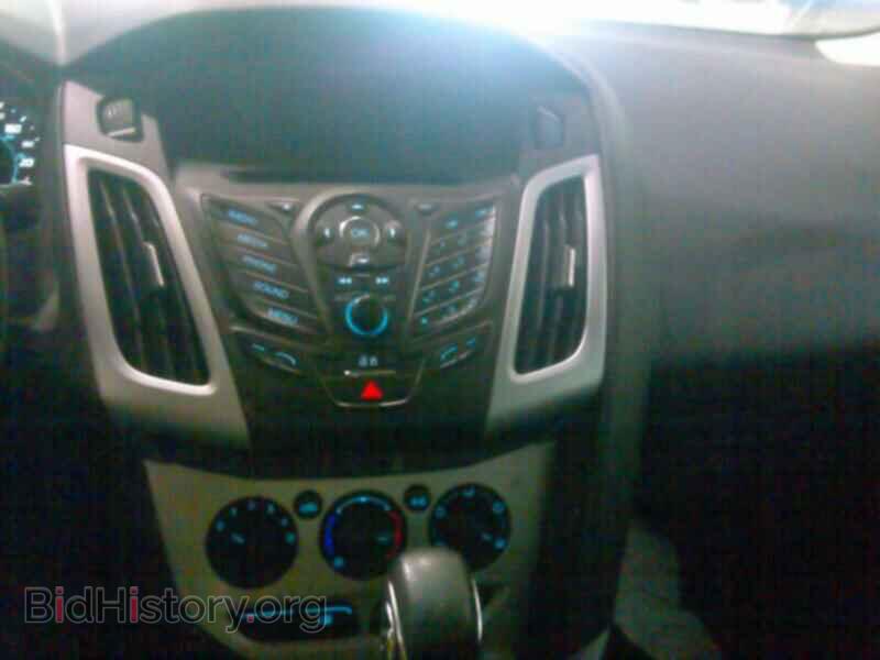 2014 Ford Focus - VIN: 1FADP3F21EL231752 - Фото 4