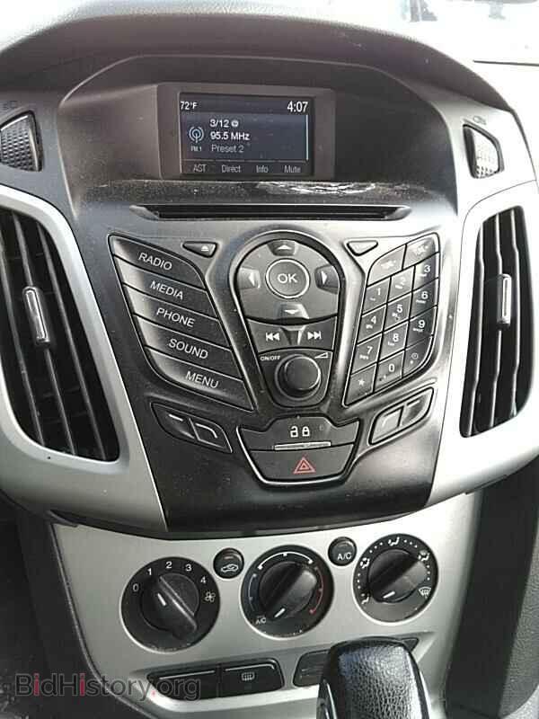 2014 Ford Focus - VIN: 1FADP3F28EL363410 - Photo 4