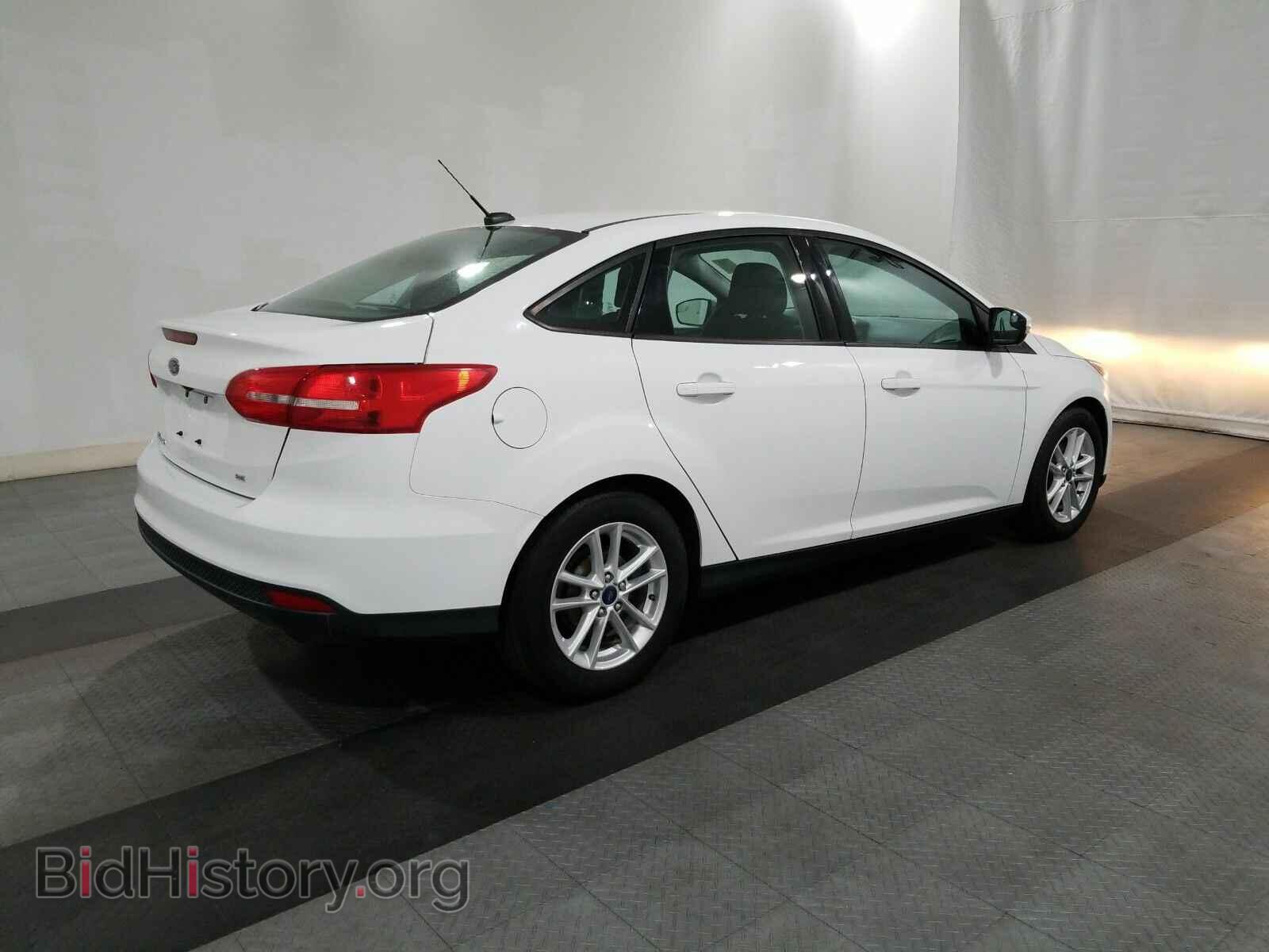 2016 Ford Focus - VIN: 1FADP3F28GL303064 - Photo 4