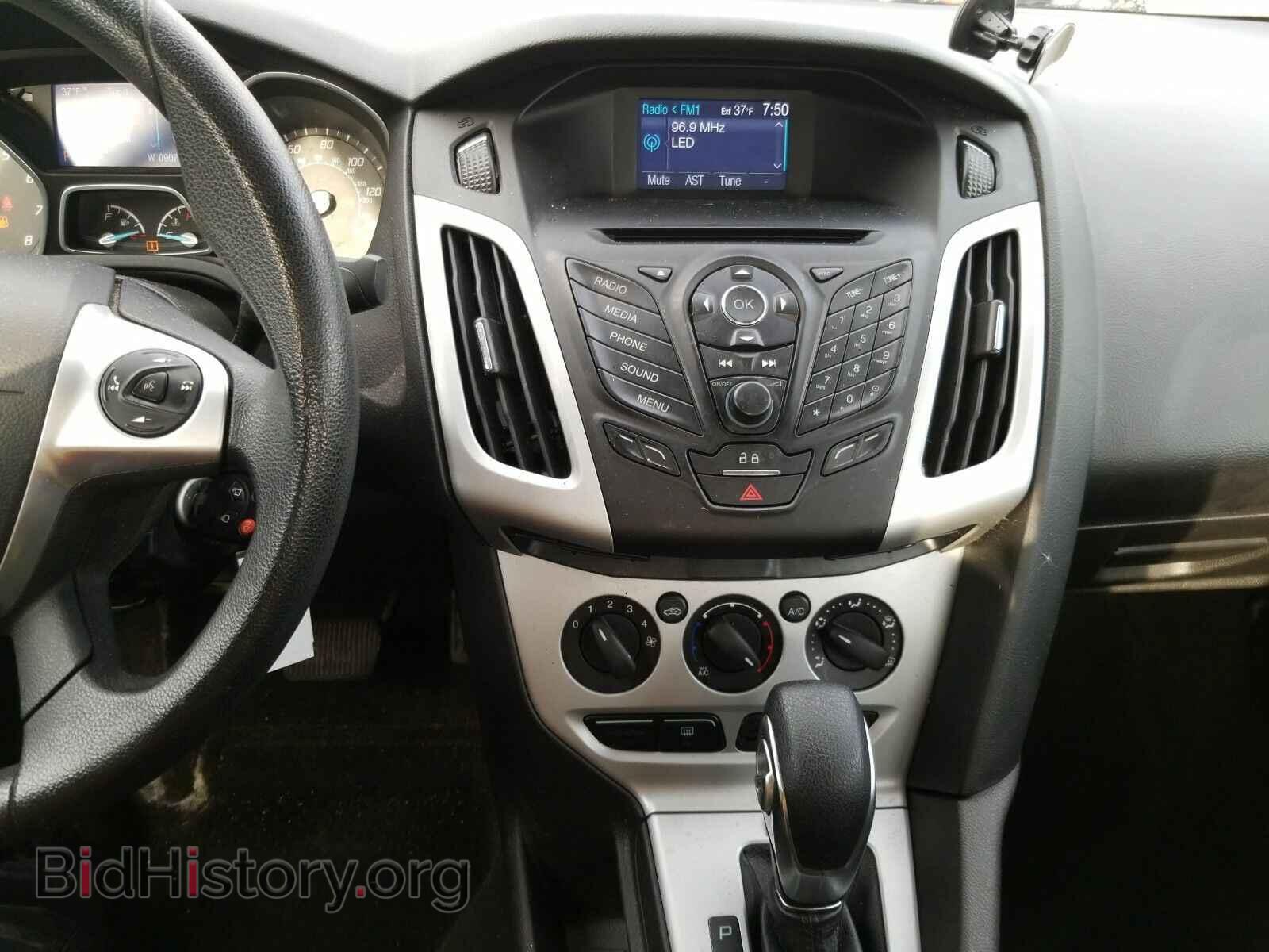 2014 Ford Focus - VIN: 1FADP3F22EL160142 - Фото 4