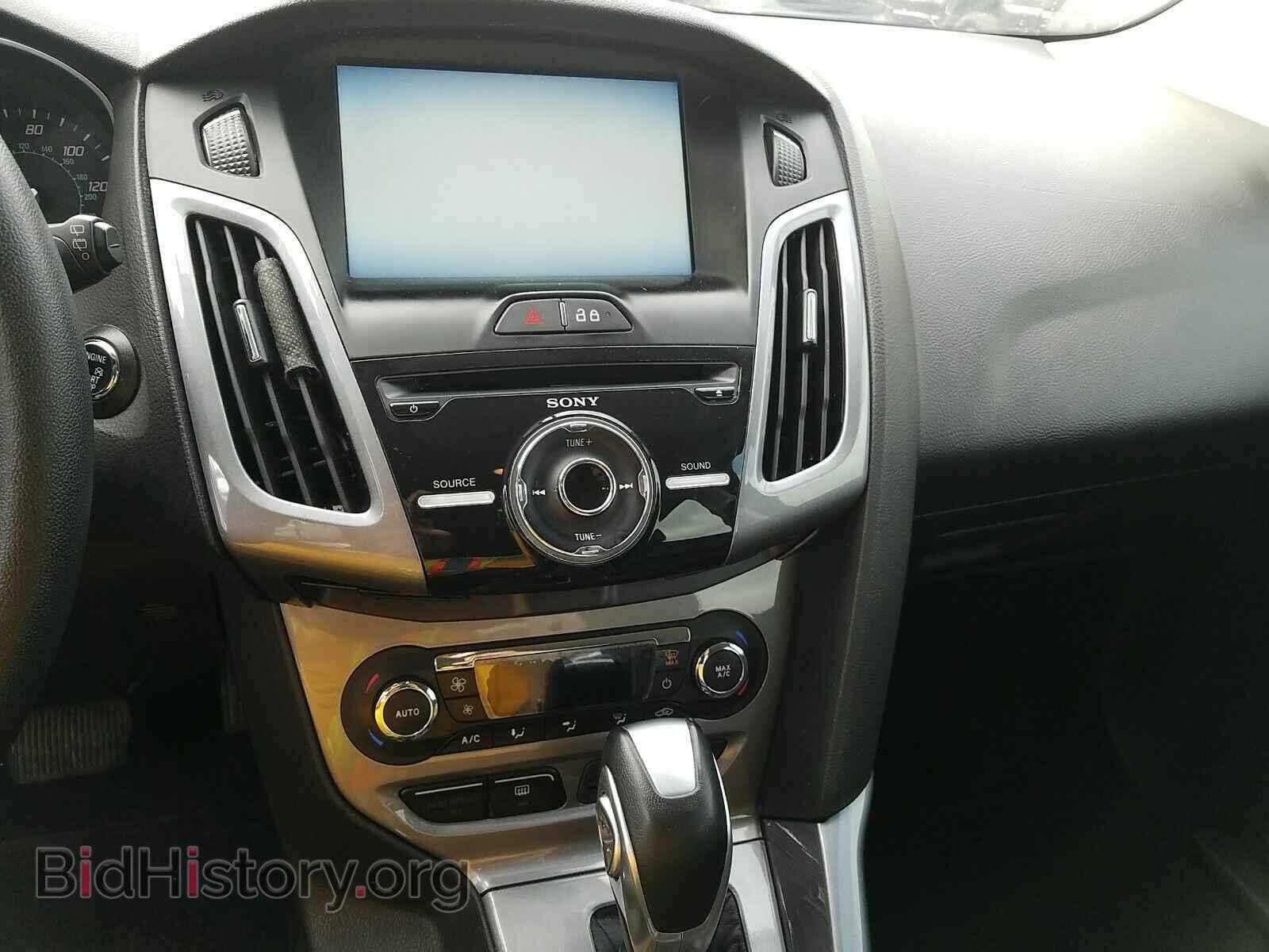 2014 Ford Focus - VIN: 1FADP3N24EL422423 - Фото 4